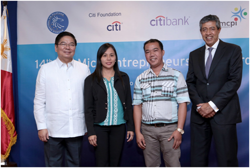 Partners in Financial Inclusion: BSP Governor Amando M. Tetango Jr. (leftmost) and Citi Philippines CEO Aftab Ahmed (rightmost) flank 2015 CMA winners Ester Vitto and Jordan Inalisan.